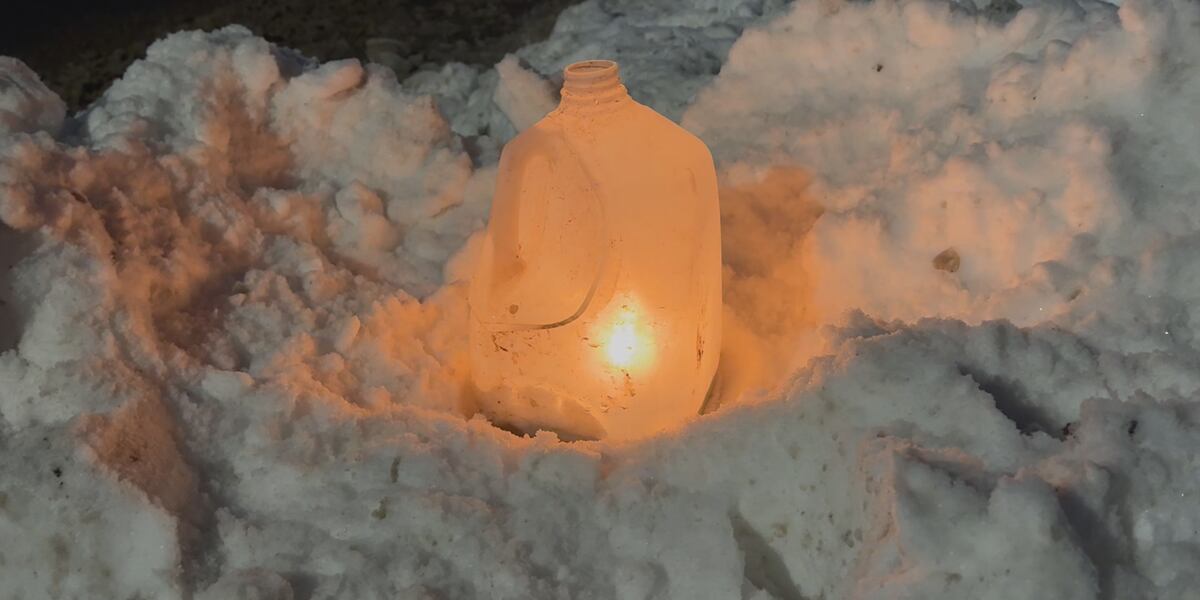 Walton community light 500 candles for local holiday tradition
