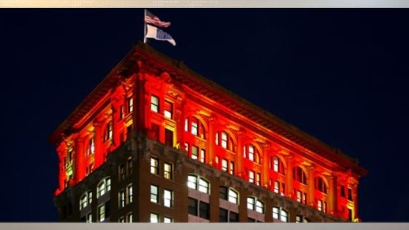 Security Mutual Building Glows Red