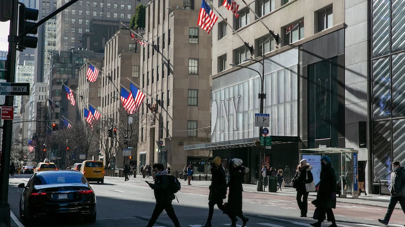 FILE - American flags wave in the wind on Fifth Avenue in the borough of Manhattan in New York...